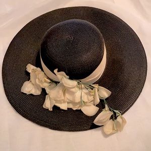 Black hat with white flowers